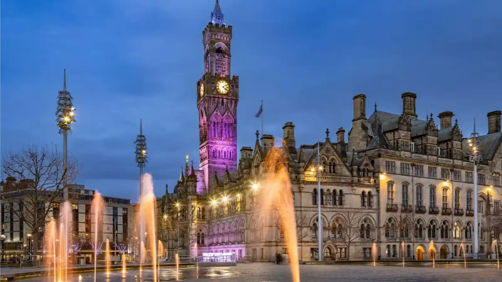 Bradford City Hall lit at dusk for a blog on visitors searching for shisha near me